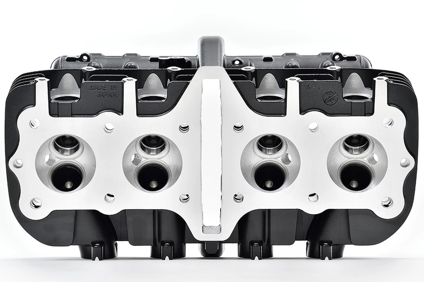 Kawasaki’s reproduction Z1 cylinder heads will sell for US$2370, including camshaft brackets, tappers, valves and peripheral parts, but not including camshafts, cylinder head cover, gaskets, etc. The heads feature the M8 exhaust-pipe-attachment stud bolt dimensions from later Z1 models, and do not fit the second-generation Kawasaki KZ1000 MKII and other so-called "square head" models.
