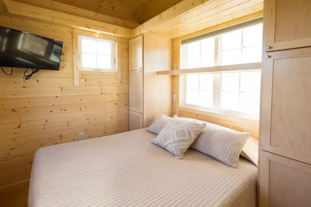 The ground floor bedroom of the Vintage XL has a queen-size bed and storage underneath