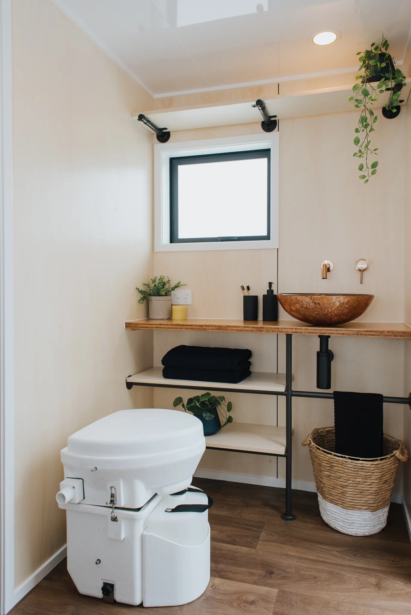 Cyril the Tiny House's toilet is a Nature's Head composting model