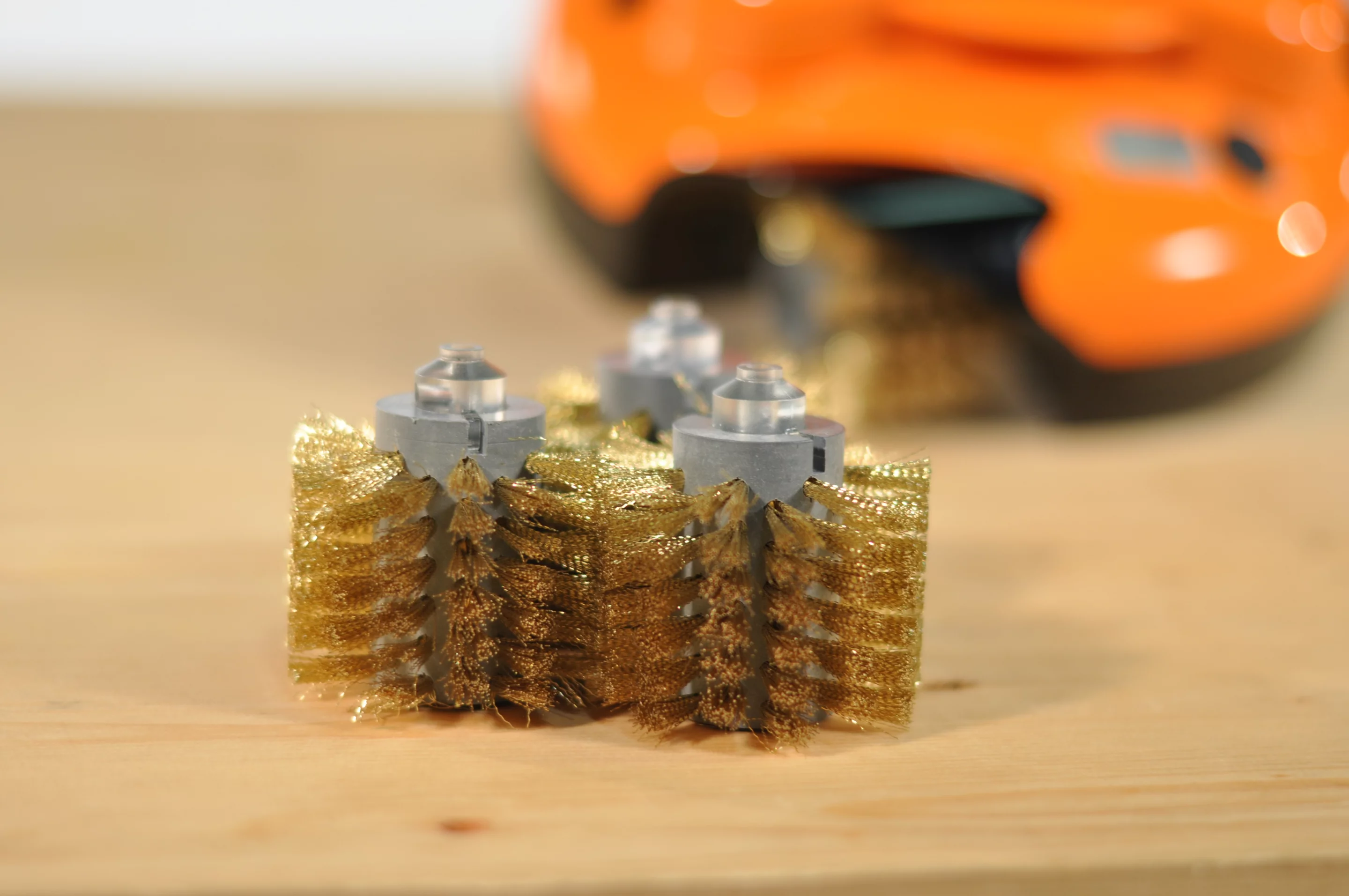 Grillbot features three replaceable brushes