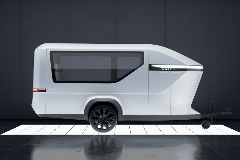 Sleek Nordic Toy-Hauler Trailer Hides Hidden Bathroom Toy-hauler campers often compromise between being cold, spartan towable garages with uncomfortable fold-down furnishings or fully equipped campers with gear cluttering the living space. The new Karoo Adventure camper aims to minimize these compromises, offering a dual-purpose design with an empty floor for gear transport and a comfortable living area featuring a panoramic design, modular furnishings, and a hidden wet bathroom.