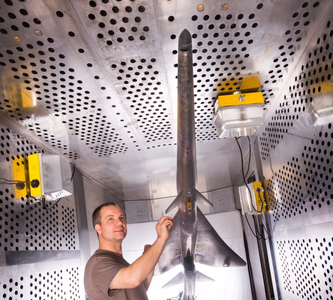 Mechanical technician Dan Pitts prepares a nine percent scale model of Lockheed Martin’s Quiet Supersonic Technology (QueSST) X-plane preliminary design for its first high-speed wind tunnel test