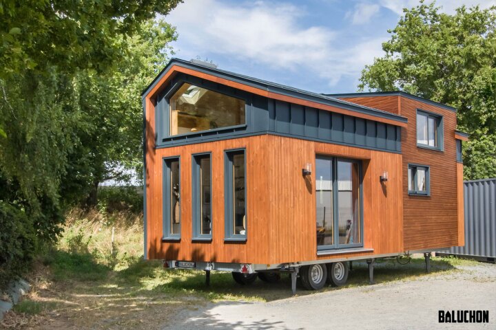 The Gaïa Tiny House is finished in pine, with aluminum accenting, and is based on a double-axle trailer