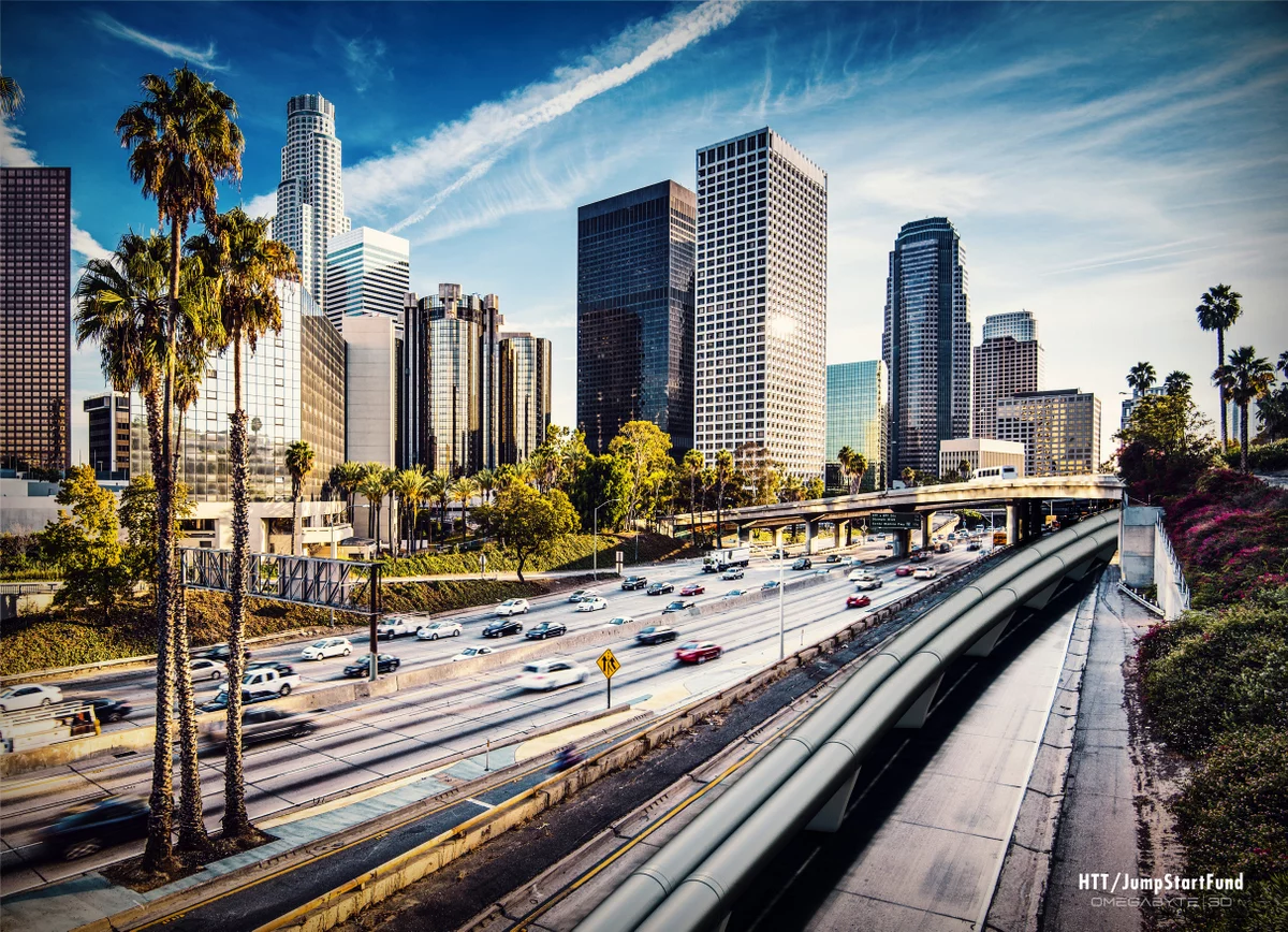 HTT's rendering of the proposed Hyperloop alongside freeway traffic in Los Angeles