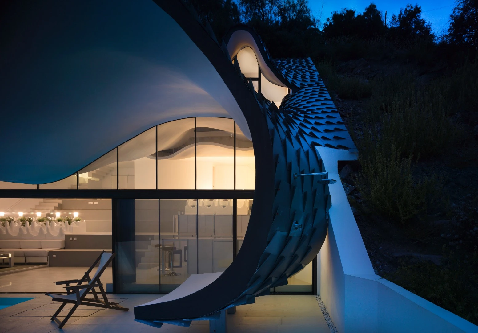 The firm says being buried into the hillside ensures a steady interior temperature of 19.5º C (67.1º F)