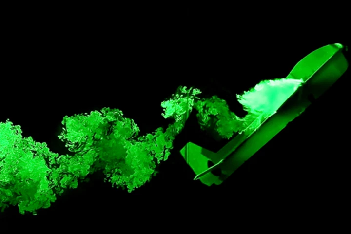 A smoke visualization still of the actual vortex wake behind our glider during a free-flight high angle of attack landing (Image: Jason Dorfman MIT/CSAIL)