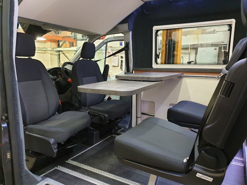 The Transit Giant lounge definitely looks more comfortable and practical than the usual cramped dual-seat bench front lounge