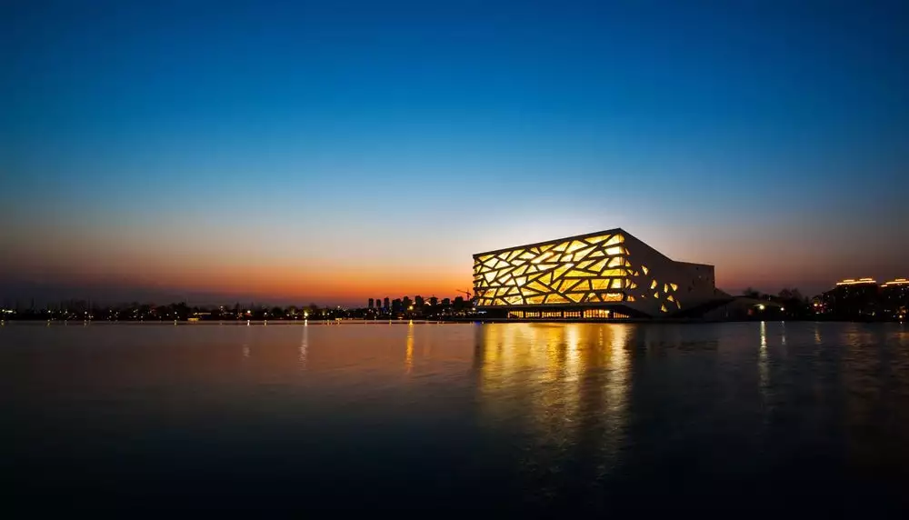 The Hangzhou Yuhang Opera also involved Hangzhou Architectural & Civil Engineering Design Institute Co. and Buro Happold Engineering, plus Bassinet Turquin Paysage and AECOM for landscaping