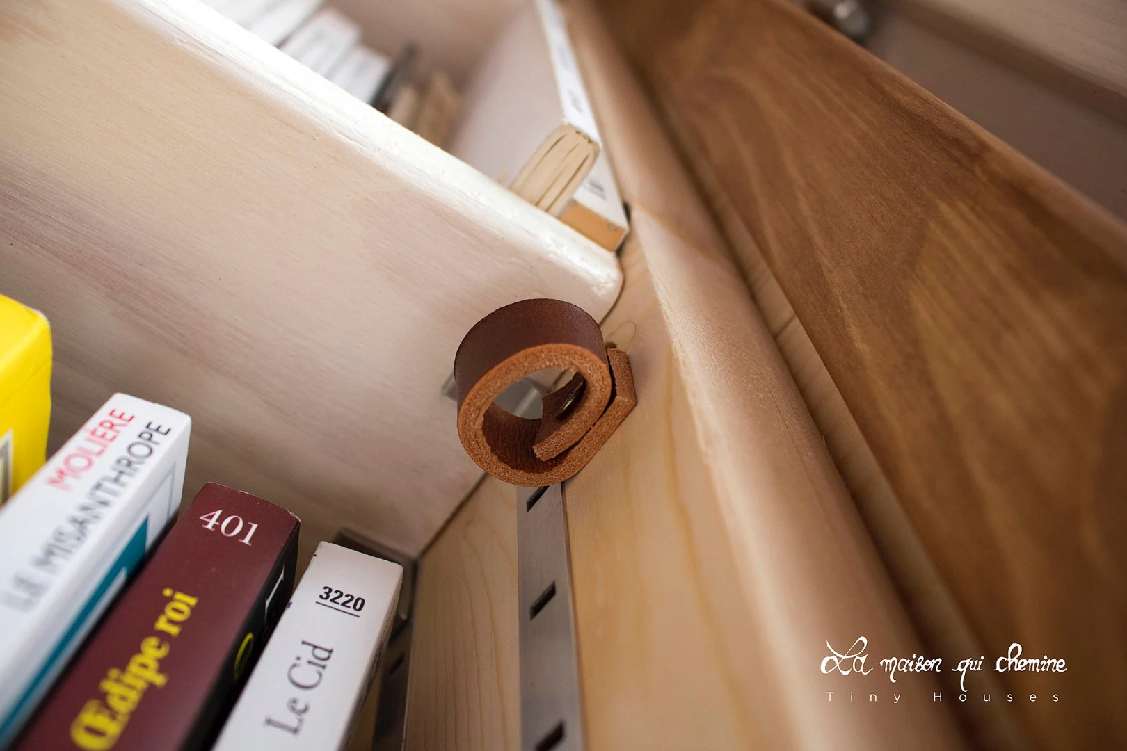 The interior is jam-packed with shelves of books