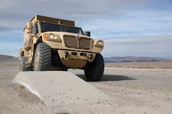 A military-spec MXT APC shows off its MaxxPro semi-active suspension