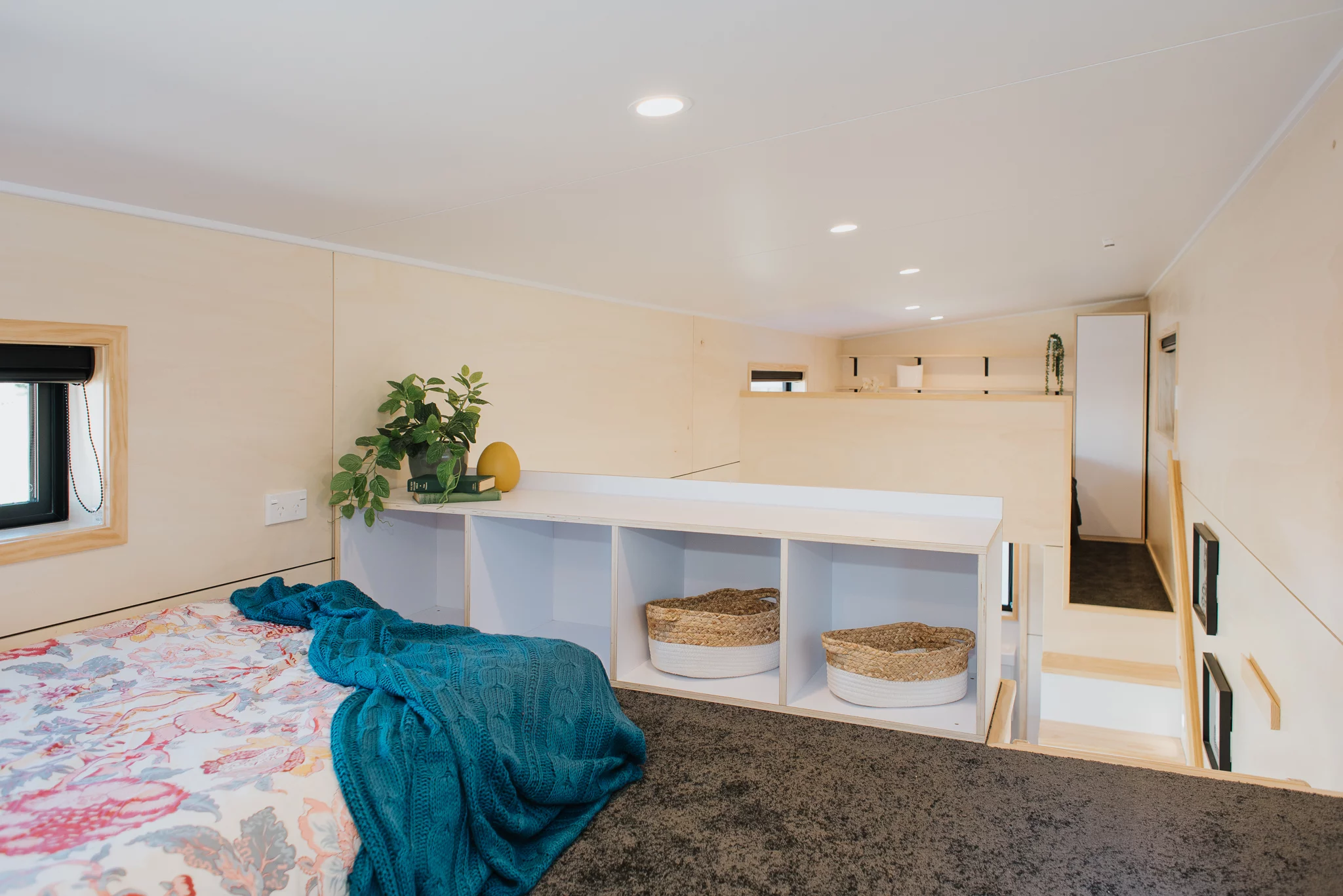 The Dreamweaver Tiny House's second bedroom also has some storage space