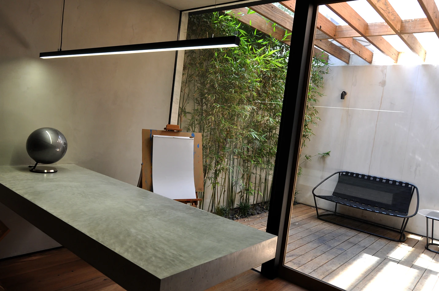 Bamboo plants were planted at the basement which extend up through to the ground floor courtyard (Photo: Edoardo Campanale for Gizmag)