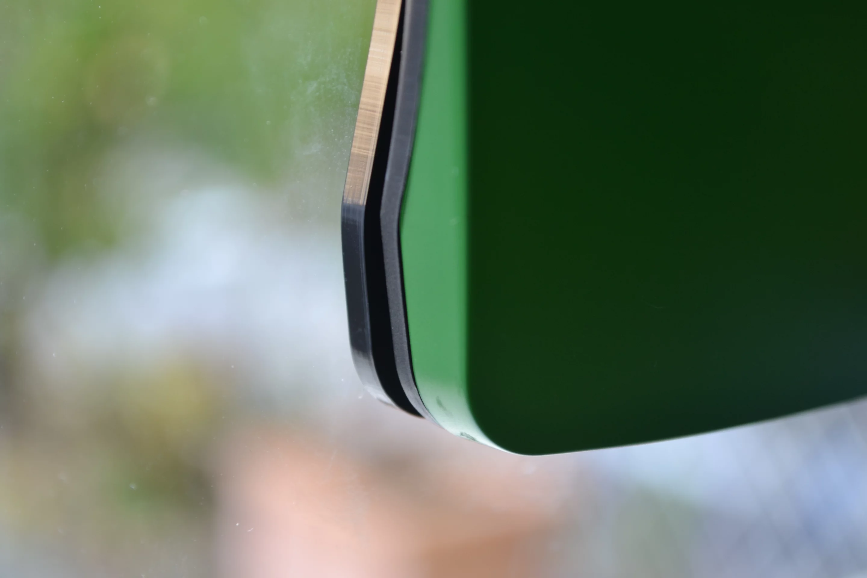 The curve to the PV face caused the charger to pull away from the supplied silicone ring, and fall