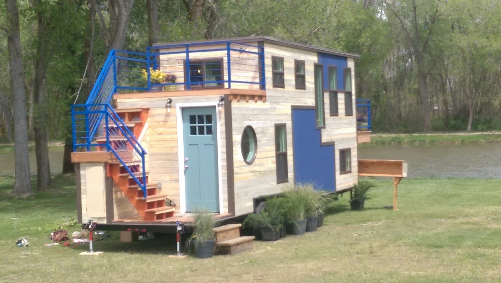 The Tiny Ski lodge sits on a custom triple-axle trailer