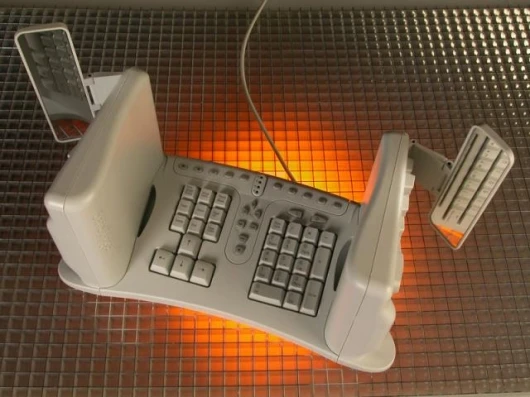 Yes folks, you thought we were joking about the rear vision mirrors didn't you - we eren't - that's the Safetype Ergonomic keyboard
