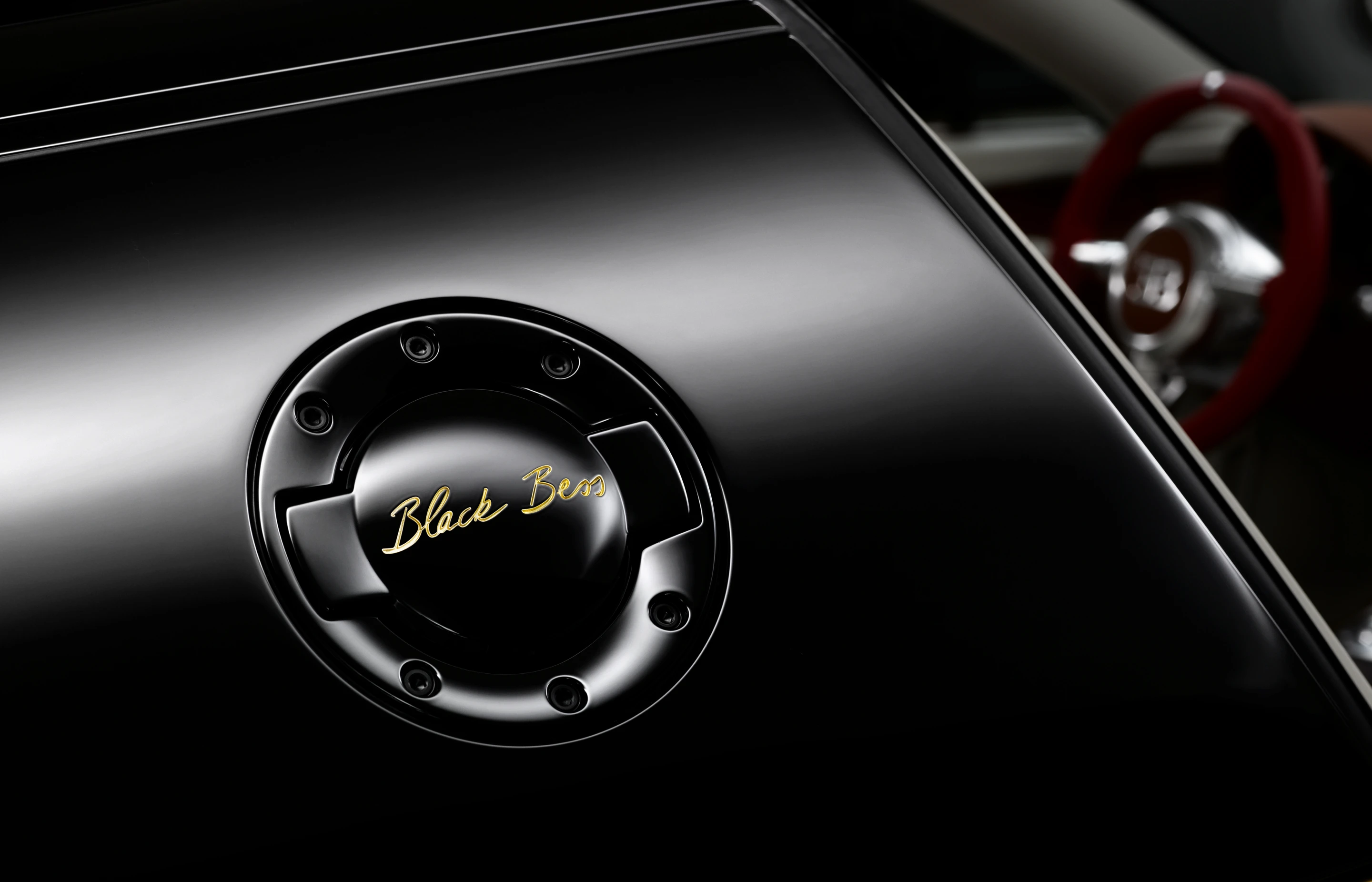 The oil and tank caps have golden Black Bess engraving