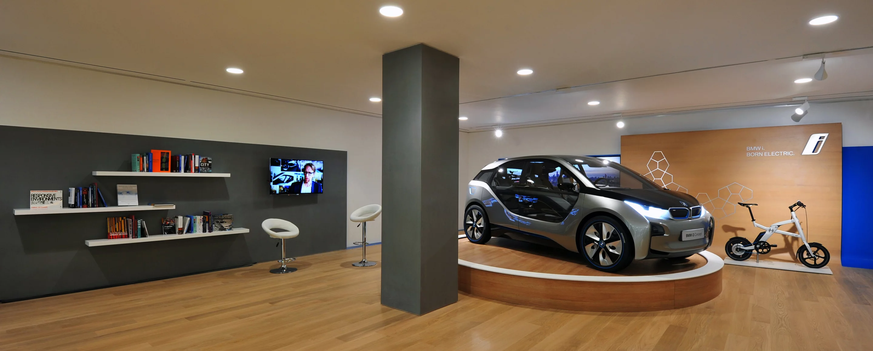 The new i Store showroom is described as a dedicated customer-oriented access point for its future range of electric vehicles and associated support solutions