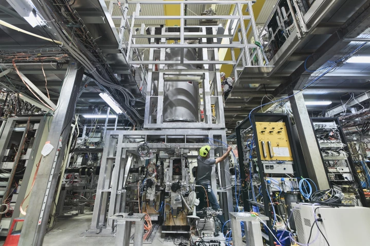 The ALPHA-g experiment being set up at CERN, which will drop antimatter to see how gravity affects it