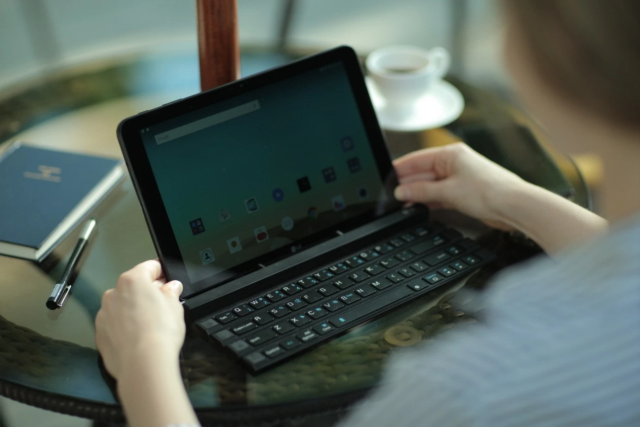LG's Rolly Keyboard has two fold-out arms to support a smartphone or tablet