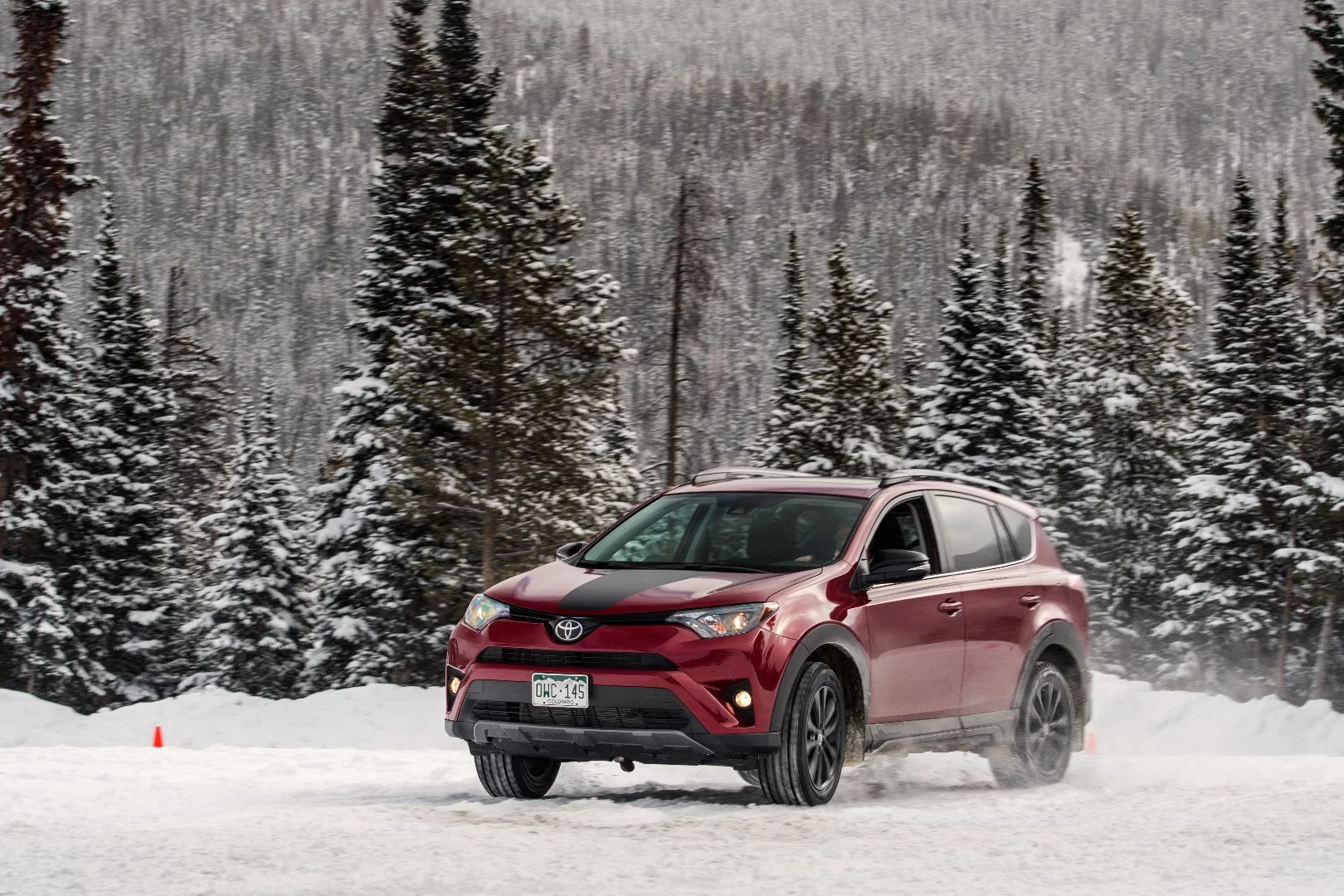 A little goosing and some gearing control allowed the Toyota RAV4 Adventure to slide some corners on the snow and ice, but a lack of power keeps it from being overly keen