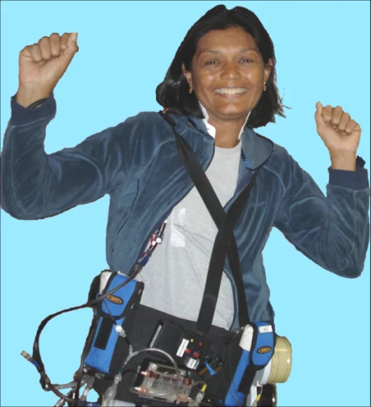A patient models the Wearable Artificial Kidney prototype - the final product is intended to be smaller and worn under clothing.