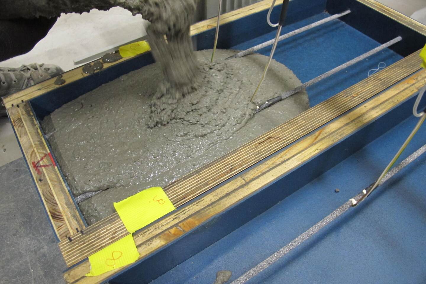 Leaner, greener, expanding concrete prestresses itself as it forms