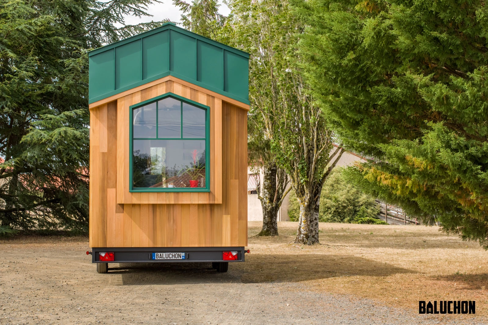 The Hauméa tiny house features a large window in the living area