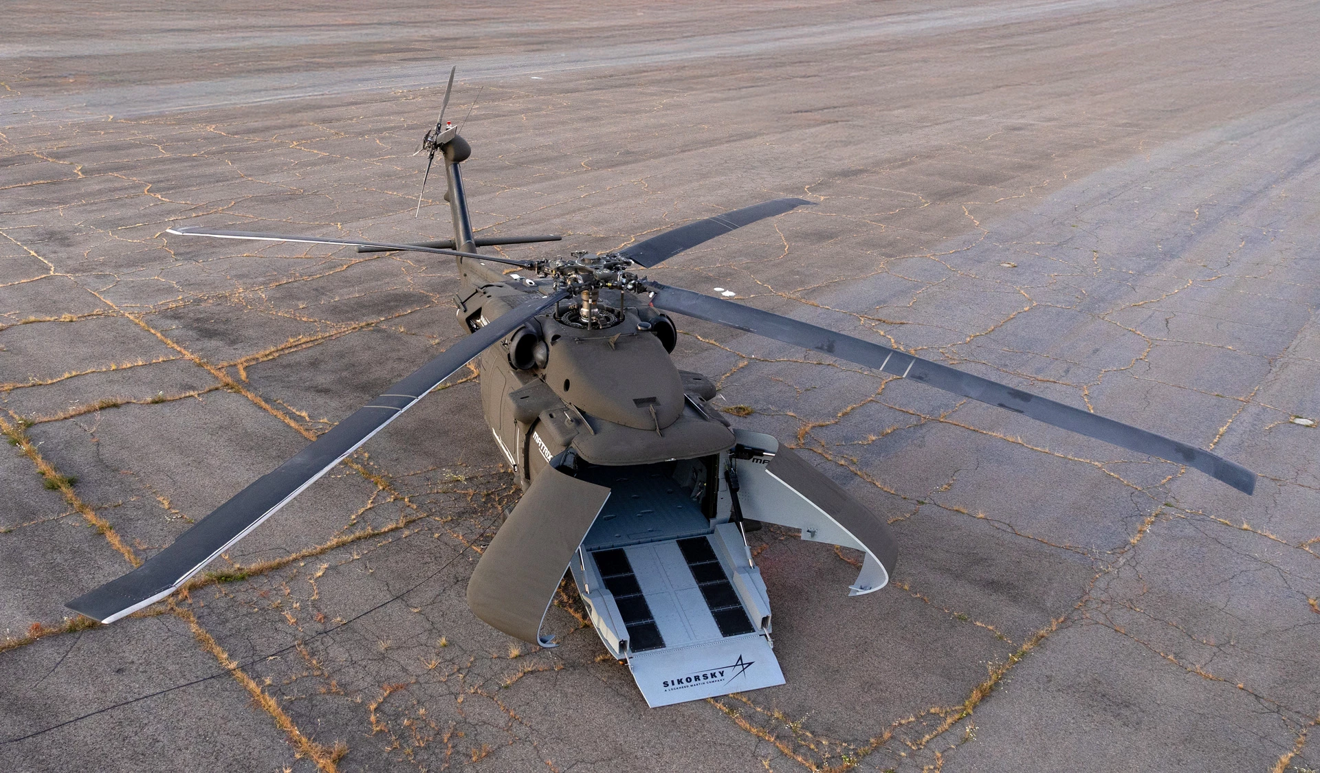 The U-Hawk has replaced the cockpit with clam-shell doors and a loading ramp