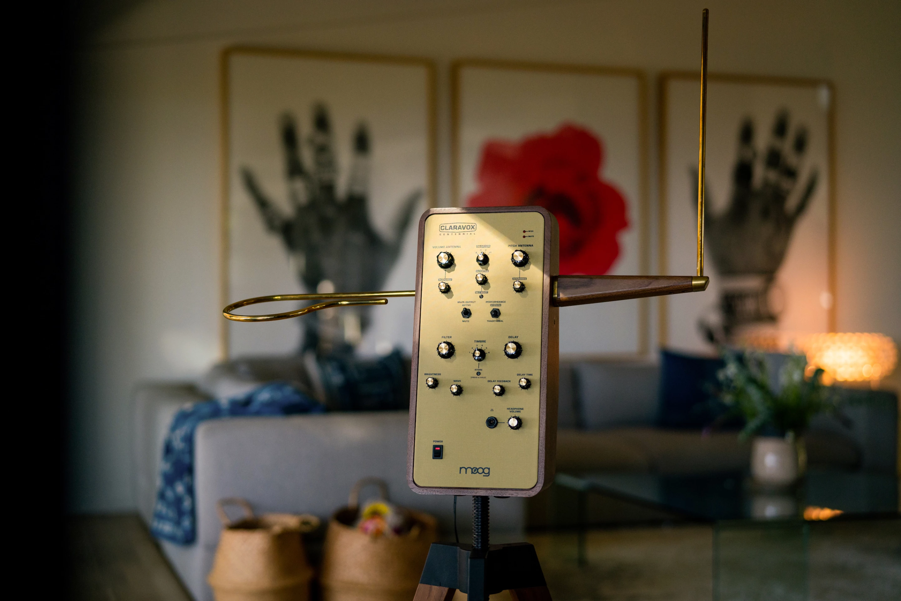 Players control pitch and volume by moving their hands around the brass antennas on the sides of the Claravox Centennial