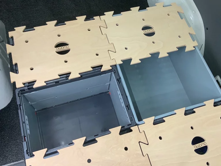 A flat solid surface on top and loads of easy-carry cargo space below