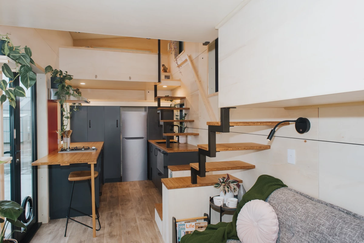 The River Bank’s kitchen includes some space-saving furniture including a drop-down table and movable cabinetry