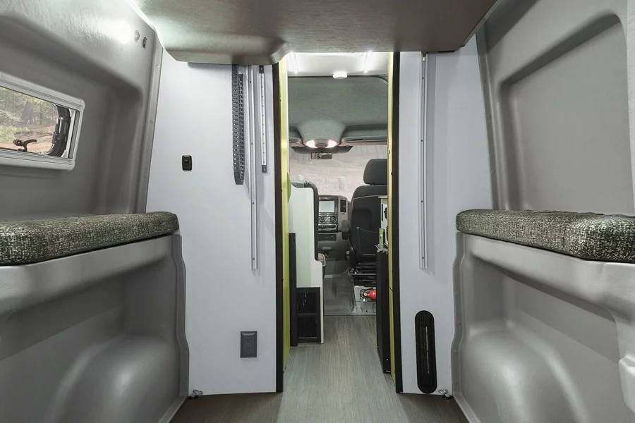 When the bed lifts out of the way, the Winnebago Revel offers plenty of room for bikes and other gear