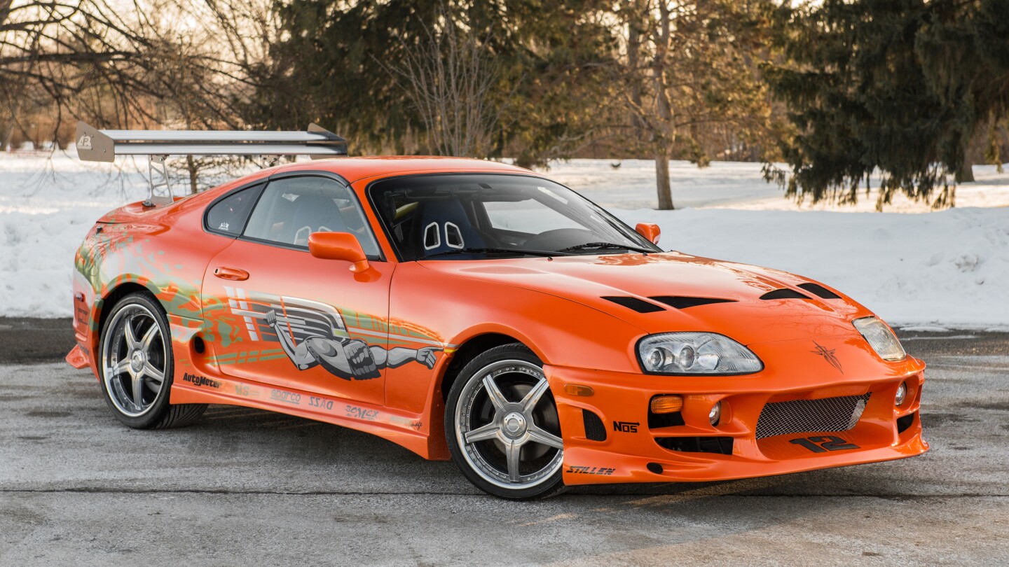 This car just might be one that surprises as the recently deceased Paul Walker is the posthumous star of Furious 7, a movie that has just been released and is smashing box office records willy nilly. The car is the iconic orange Toyota Supra driven by Walker in The Fast and The Furious (2001), is expected to fetch $150,000 to $200,000 but ... anything could happen on the day.