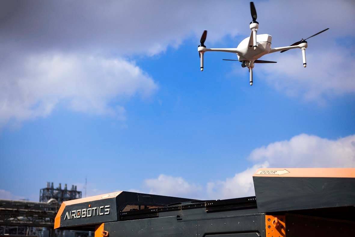 An Airobotics drone approaches its docking station