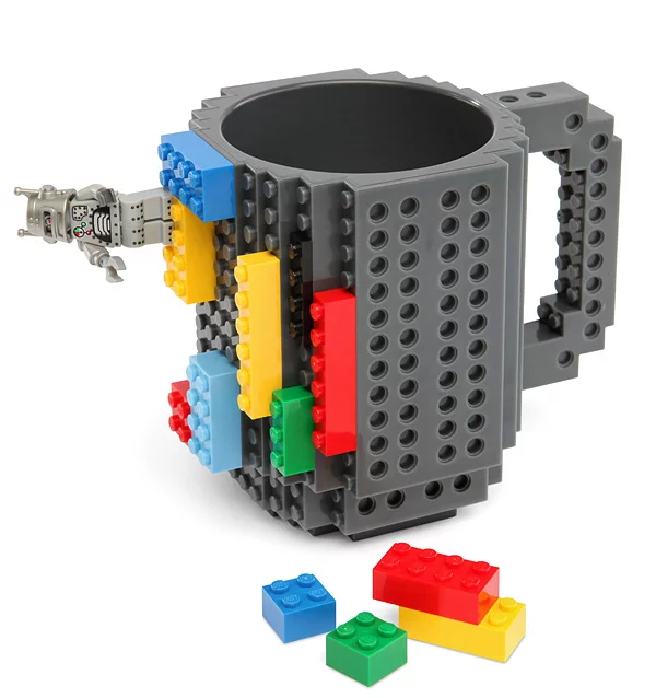The Build-On Brick Mug is a coffee cup covered in studs and holes for attaching Lego and other building blocks to customize it