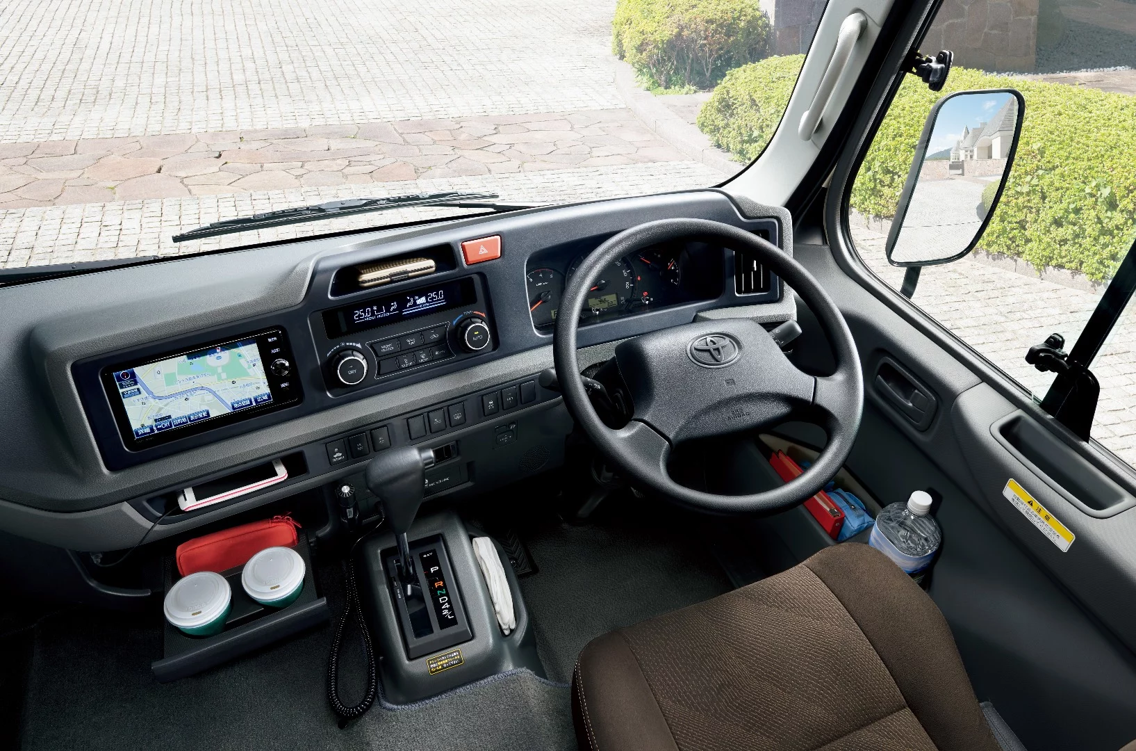 Behind the wheel of the new Coaster