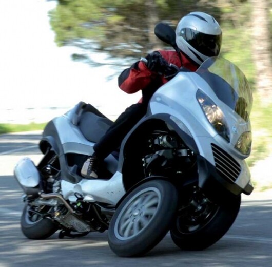 Vespa's very sporty three wheeled scooter