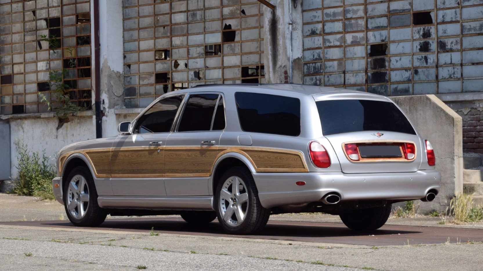 The brand new car was shipped to the famous American modification specialist Genaddi Design, where the Bentley body was recrafted and extended into a new "estate car" shape