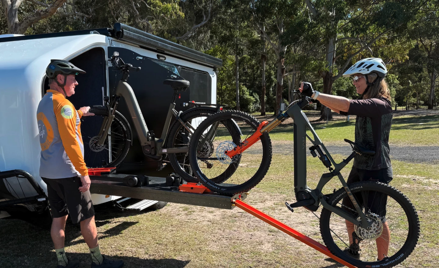 The $3,500 optional ebike loader includes a retractable ramp and slide-away platform for easily storing two ebikes in the nose cone gear garage