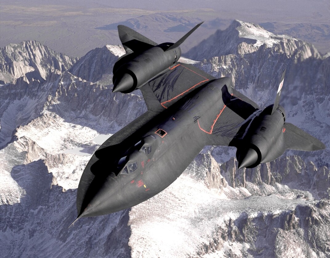 SR-71B Blackbird, NASA 831, slices across the snow-covered southern Sierra Nevada Mountains of California after being refueled by an Air Force tanker during a 1994 flight. SR-71B was the trainer version of the SR-71. The dual cockpit to allow the instructor to fly. Note the streaks of fuel from refueling spillage.