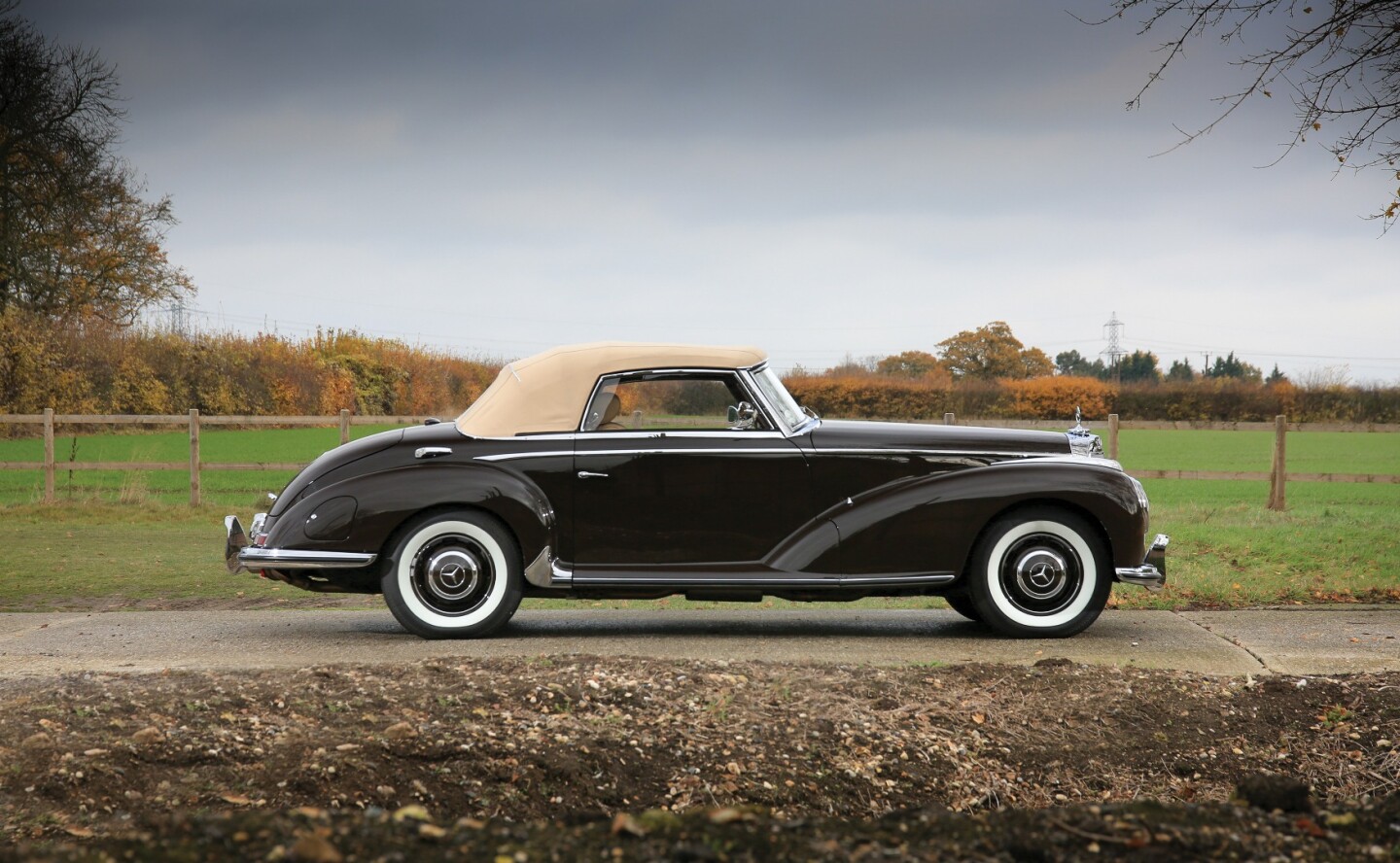 This 1954 Mercedes-Benz 300 S Roadster is a car which encapsulates the spirit of both per-and post-war eras for Mercedes-Benz. This was the road car which Mercedes-Benz produced specifically in order to become the world's most expensive and exclusive automobile. Built in a time of austerity and rationing, this roadster was the last word in opulence and sophistication.When launched at the Paris Salon in 1951, it cost twice as much as a Cadillac, and its modernized 540K styling attracted royal owners such as King Faruk of Egypt and the Aga Khan, and the most dashing male lead movie stars of the day in the form of Cary Grant and Gary Cooper. Much rarer (800 only) than a 300 SL and far more luxurious, three body styles were offered: a 2+2, coupé or the rarest roadster version. It offered extraordinary value and exclusivity beyond the 300 SL, selling for $793,713 (€646,250)