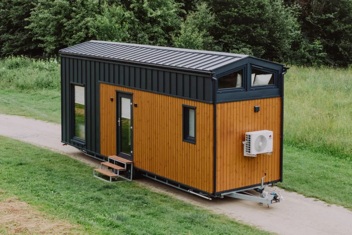 The Alan, by Craft House, is a mid-sized two-bedroom tiny house with a clever space-saving layout
