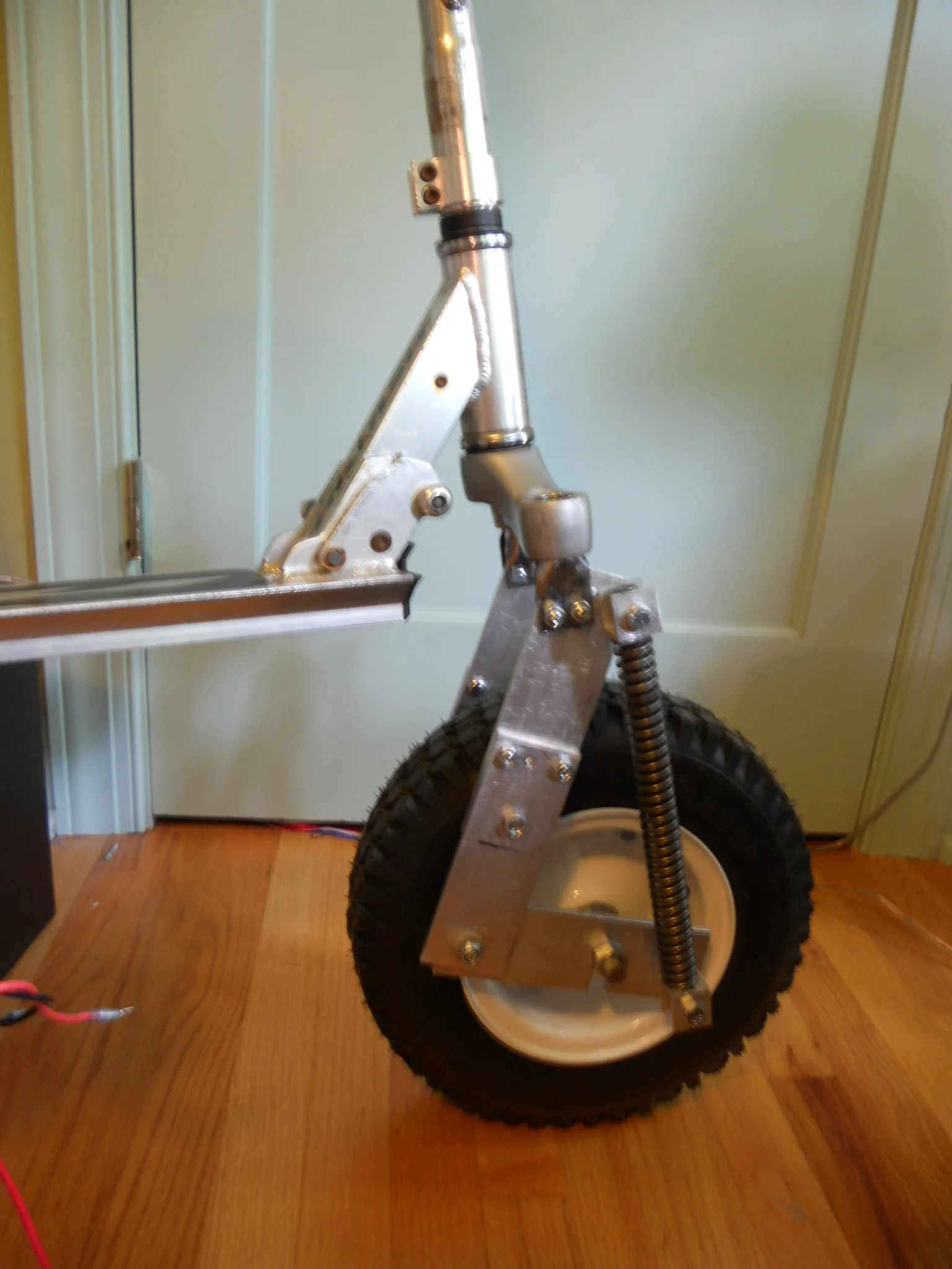 The motorless test run revealed some handling problems, so Katz rebuilt the front fork, which slightly raised the angle of the deck but improved performance