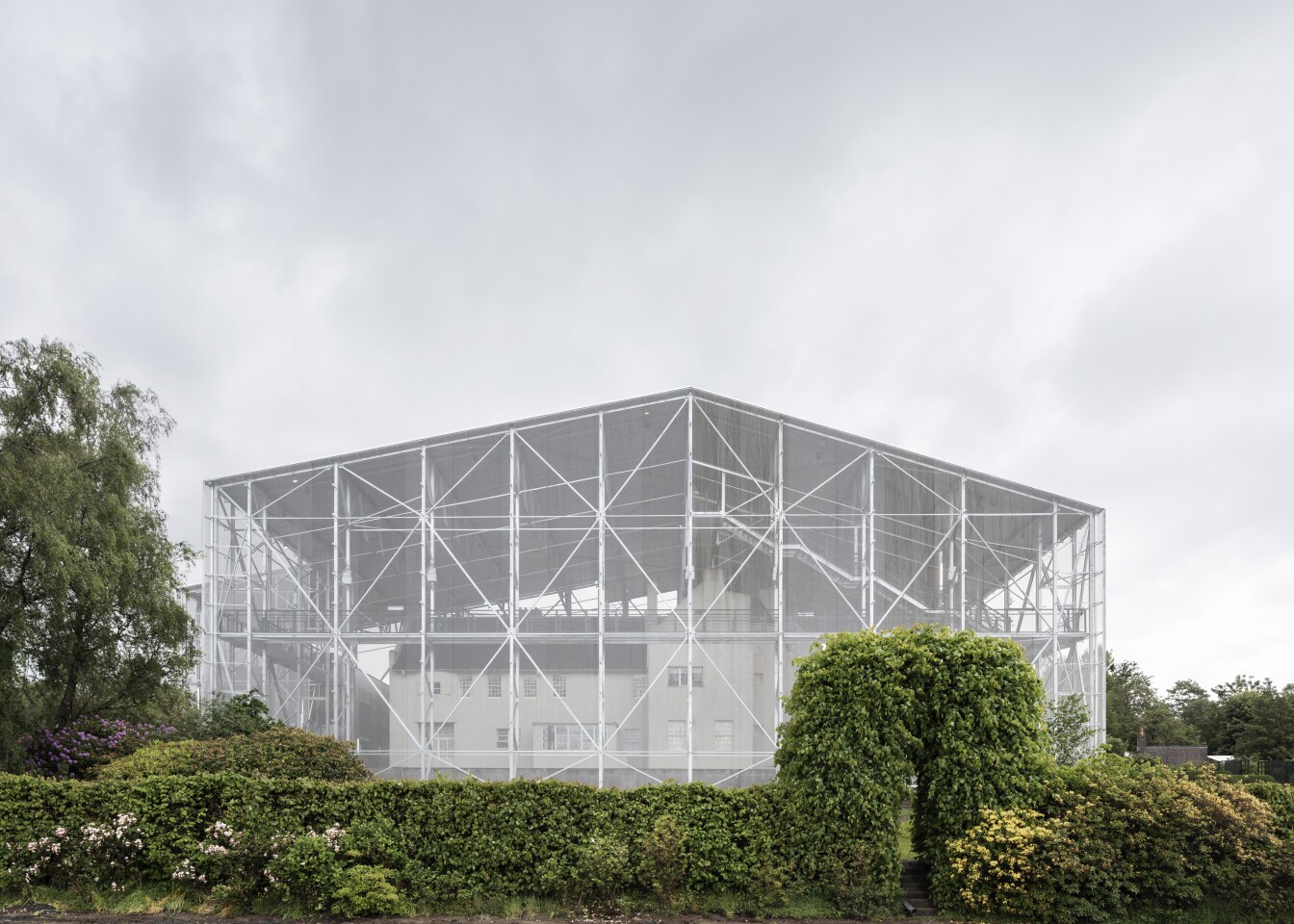 The Hill House Box was designed by Carmody Groarke and is located in Scotland. The renovation project protects Charles Rennie Mackintosh's historic Hill House from water damage