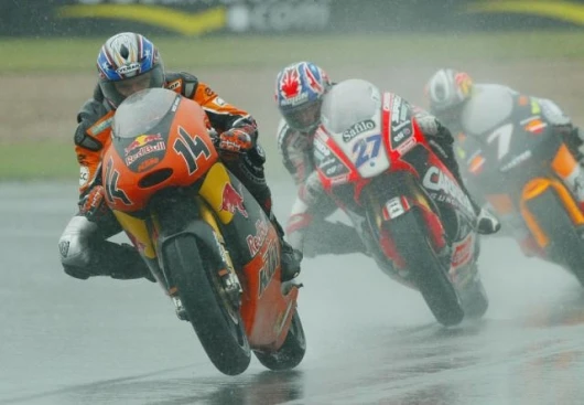 West, fellow-Aussie Casey Stoner and Randy de Puniet. Image: O. Bergamaschi