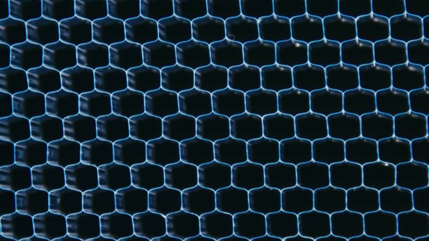 The acoustic meta-material is a lattice structure covered by a thin plastic film