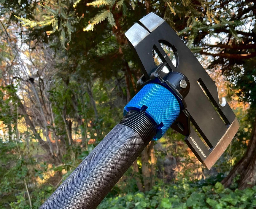 One of the main Rockworkx T7 implements, the axe head doubles as a hoe and a pry bar, depending upon how it's attached