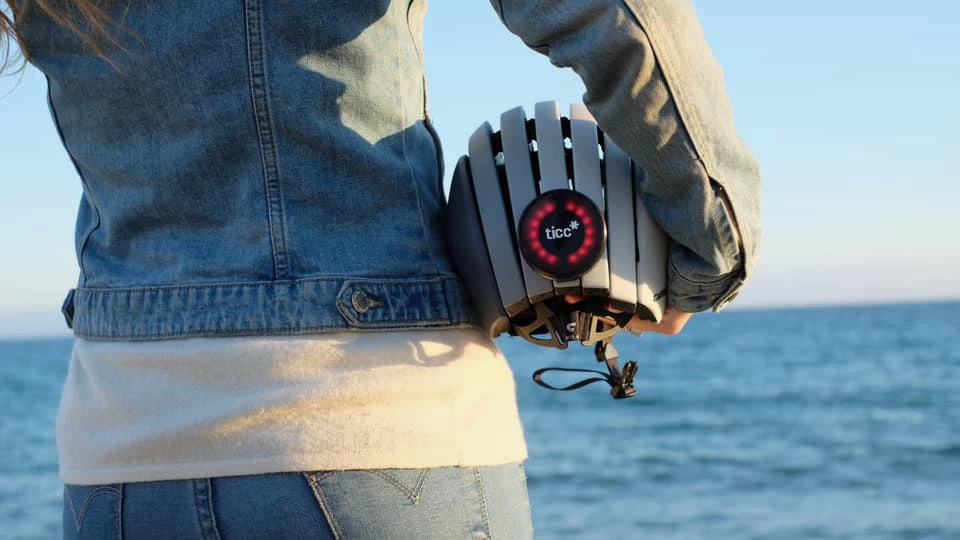 ticc (pictured here on an unusual folding helmet) is presently on Kickstarter