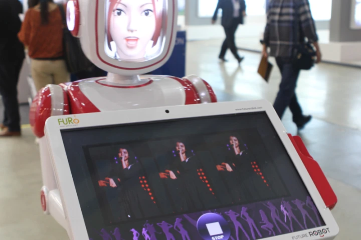 Future Robot's service robot FURO can perform a simple dance, looks sad when customers leave, and carries a touch screen that can function as a menu in restaurants.