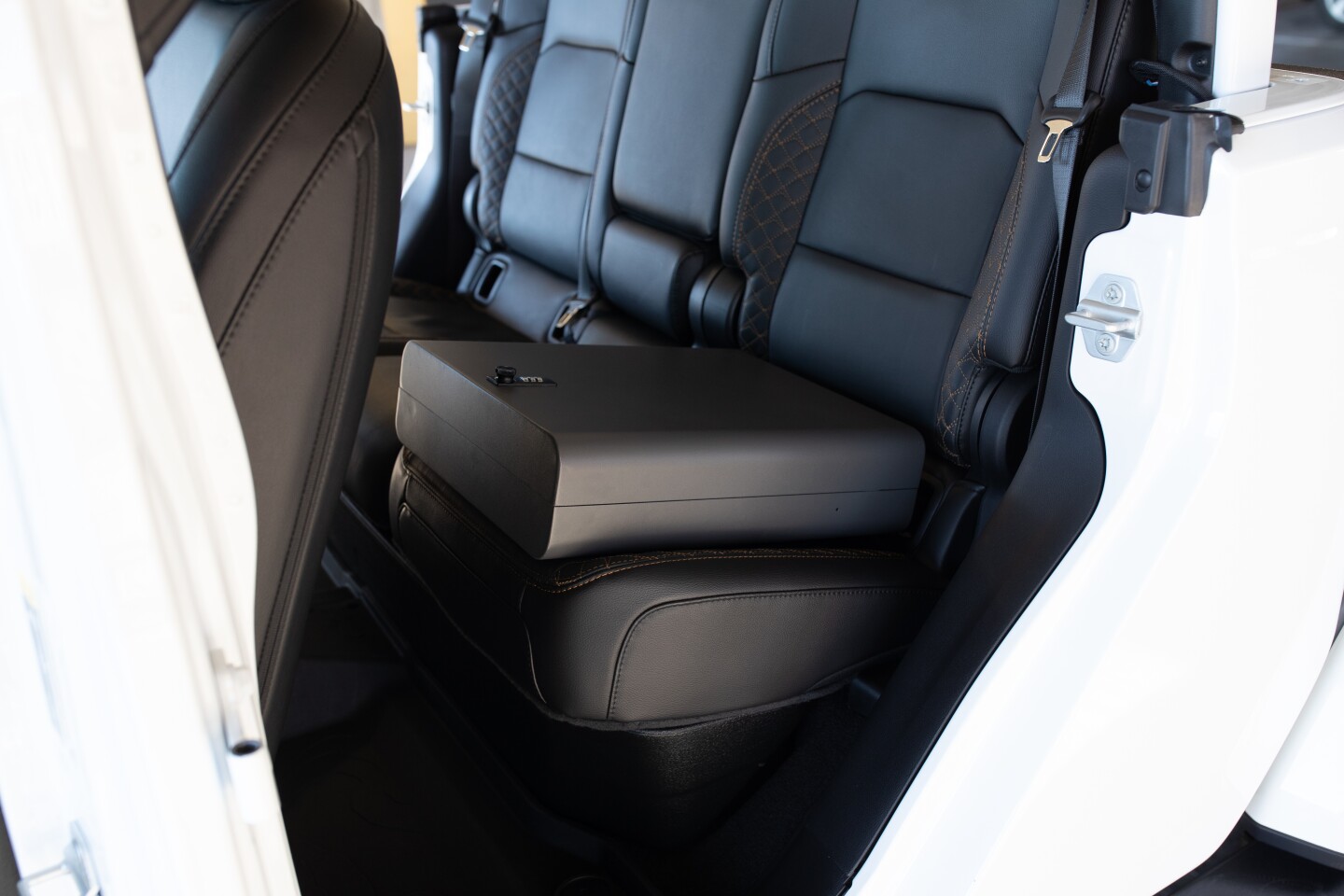 Boosted Safe locks to your car and looks like a booster seat